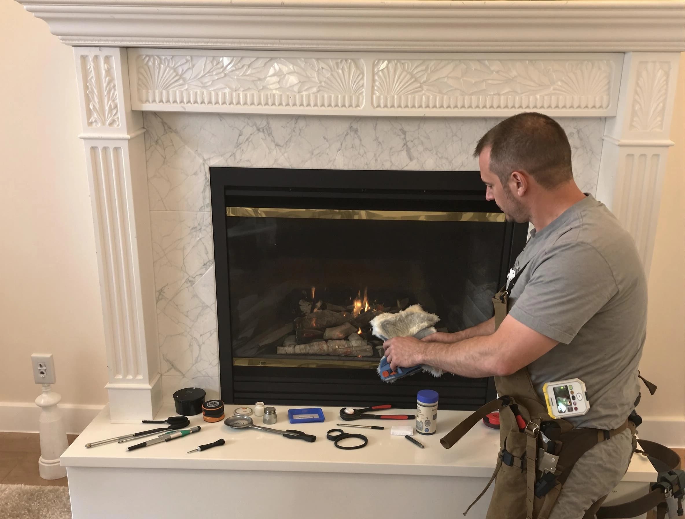 Brookhaven Chimney Sweep performing fireplace maintenance in Brookhaven, GA